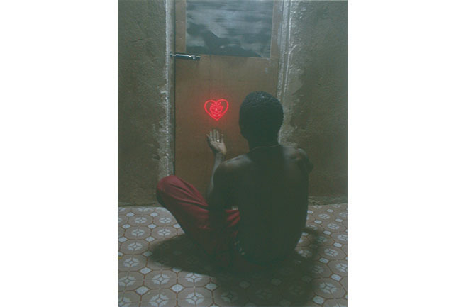 Mohamed Camara. <em>Certains matins, j'ai la tête dans le cul</em> from the series <em>Certains matins,</em> 2004-2006. Chromogenic print 27.9 x 37.3 cm (11 x 14.7 in.). Courtesy the artist and Galerie Pierre Brullé. Certains matins